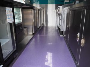The custom kitchen with Purple Rhino non-slip flooring.