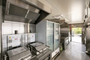 Interior view of the KFC chicken truck kitchen.