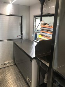 A part of the kitchen inside the Dusty Moose BBQ food truck