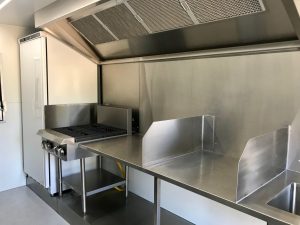 Inside view of the Ban Mi An food truck's kitchen.