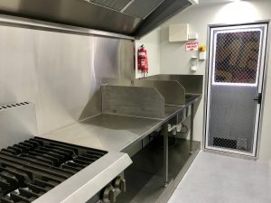 Inside view of the Ban Mi An food truck's kitchen.