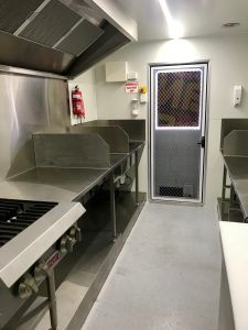 Inside view of the Ban Mi An food truck's kitchen.