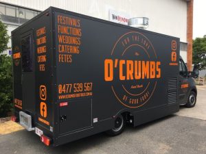 Side view of the O'Crumbs food truck.