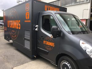 Side view of the O'Crumbs food truck.