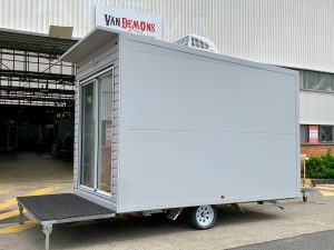 Side view of the Portable Room Solutions trailer.
