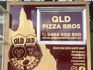 Rear view of the QLD Pizza Bros food truck.