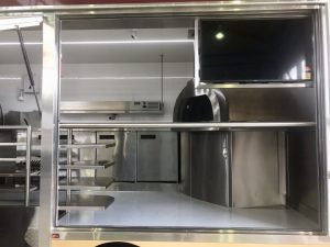 Inside view of the QLD Pizza Bros food truck kitchen.