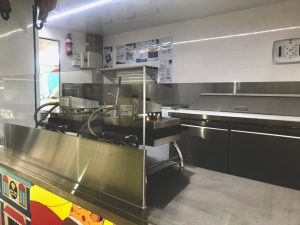 Inside view of the New York Waffles food trailer kitchen.
