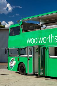 Side view of Woolworths' promotional bus.