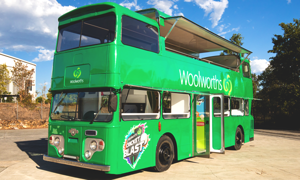 Side view of Woolworths' promotional bus.