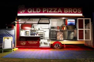 Side view of the QLD Pizza Bros food truck.