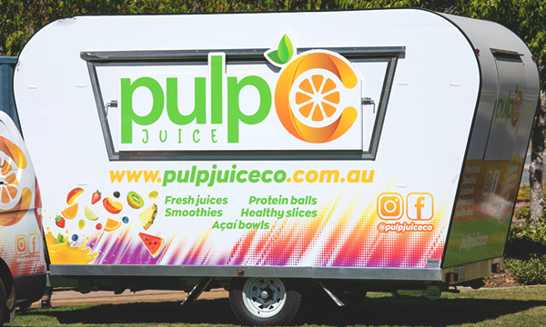 Side view of Pulp Juice Co's juice van.