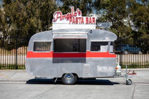 Side view of Angelo's pasta bar caravan.