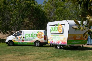 Side view of Pulp Juice Co's juice van.