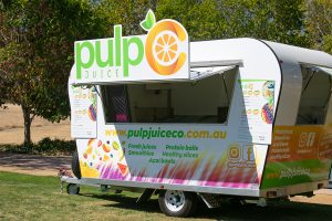 Side view of Pulp Juice Co's juice van.