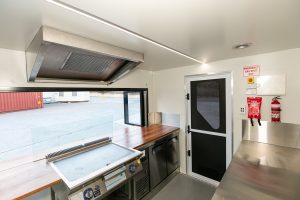 Inside view of the Radical Eats food trailer kitchen.