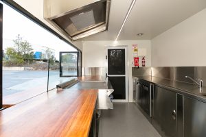 Inside view of the Radical Eats food trailer kitchen.