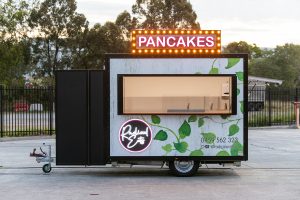 Side view of the Radical Eats food trailer.