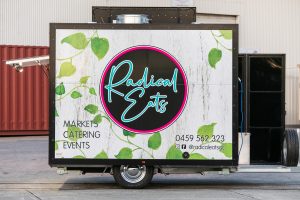 Side view of the Radical Eats food trailer.