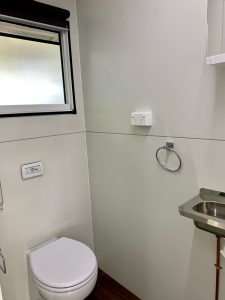 Inside view of the Room2Move accommodation trailer bathroom.