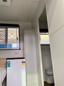 Inside view of the Room2Move accommodation trailer bedroom.