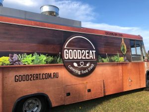 Rear view of the Good2Eat Catering bus.