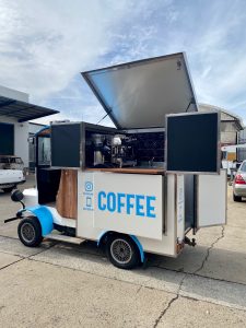 Side view of the Bolwell Brew coffee cart.