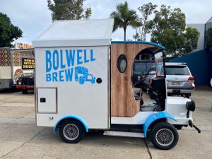 Side view of the Bolwell Brew coffee cart.