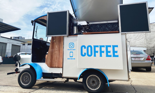 Side view of the Bolwell Brew coffee cart.