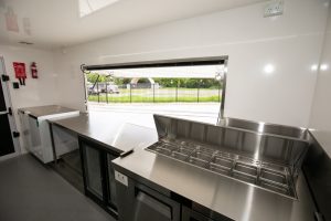 Inside view of the Kickass Catering truck kitchen.