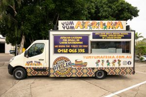 Side view of the Yum Yum Afrika food truck.