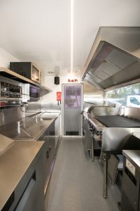 Inside view of the Yum Yum Afrika food truck kitchen.