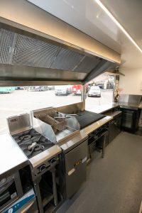 Inside view of the Yum Yum Afrika food truck kitchen.