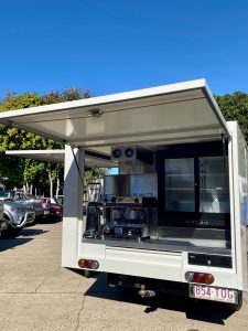 Rear view of the Pie Guru smoko van.