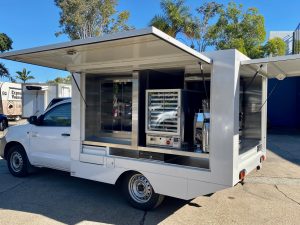 Side view of the Pie Guru smoko van.