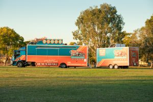 Side view of Robbie’s Roadside Diner truck and trailer combo.