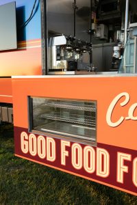 Detail view of Robbie’s Roadside Diner truck and trailer combo.