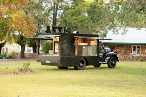 Side view of the Sons of Napoli pizza truck.