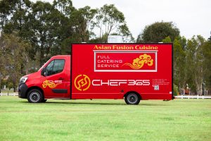 Side view of the Chef 365 catering van.